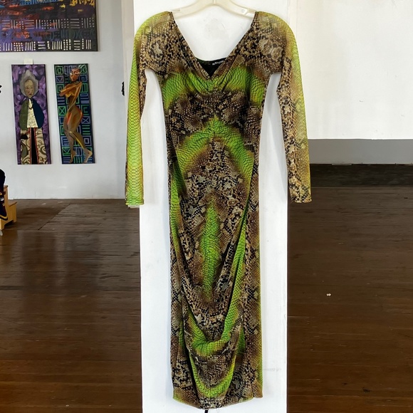 Pretty Little Things Dresses & Skirts - Pretty Little Things green animal print dress